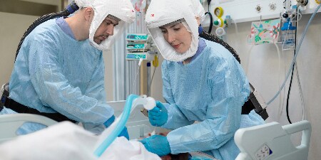 healthcare worker wearing disposable respirator

